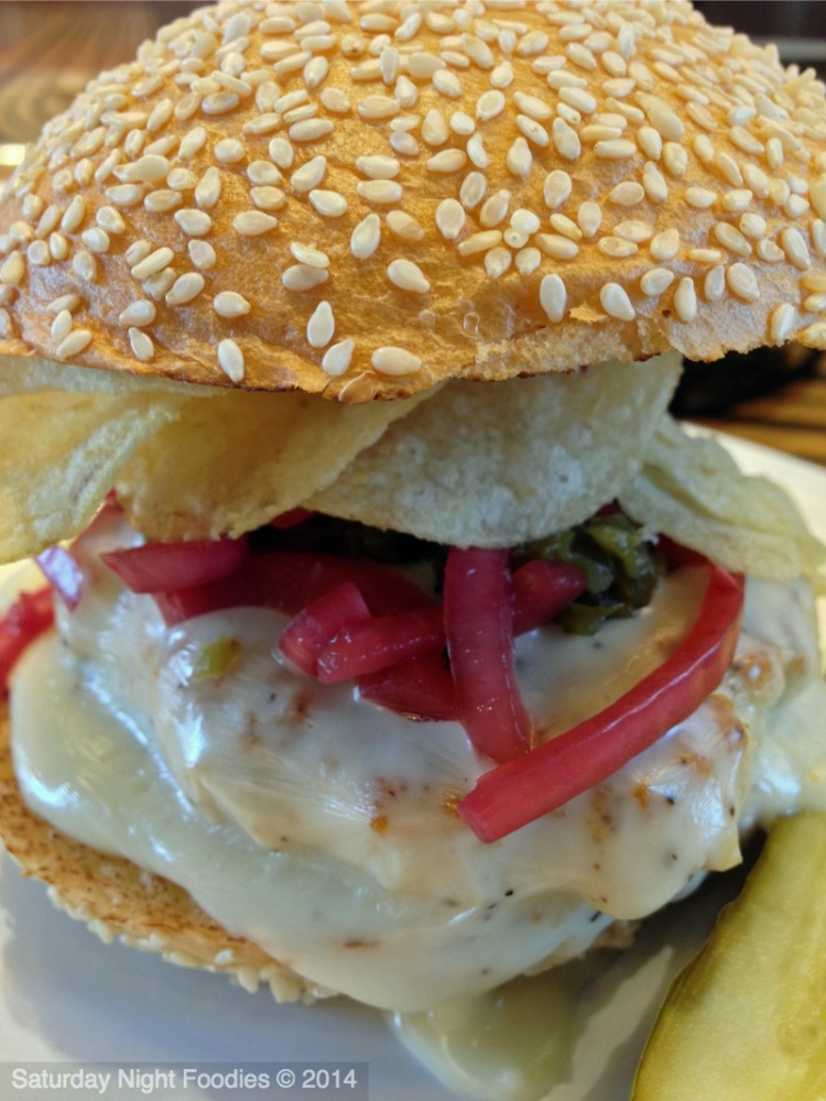 New Mexico - Queso Sauce, Roasted Green Chiles & Pickled Red Onions on a Turkey Burger